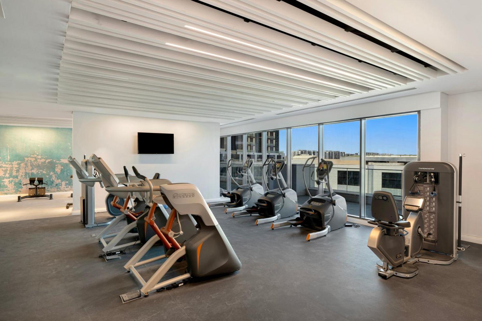 Rixos Premium Alamein El Alamein Kültér fotó The gym at the hotel